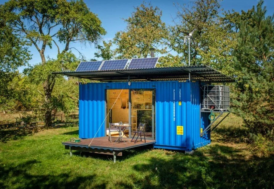 The Gaia off-grid container house has a custom rooftop wind turbine