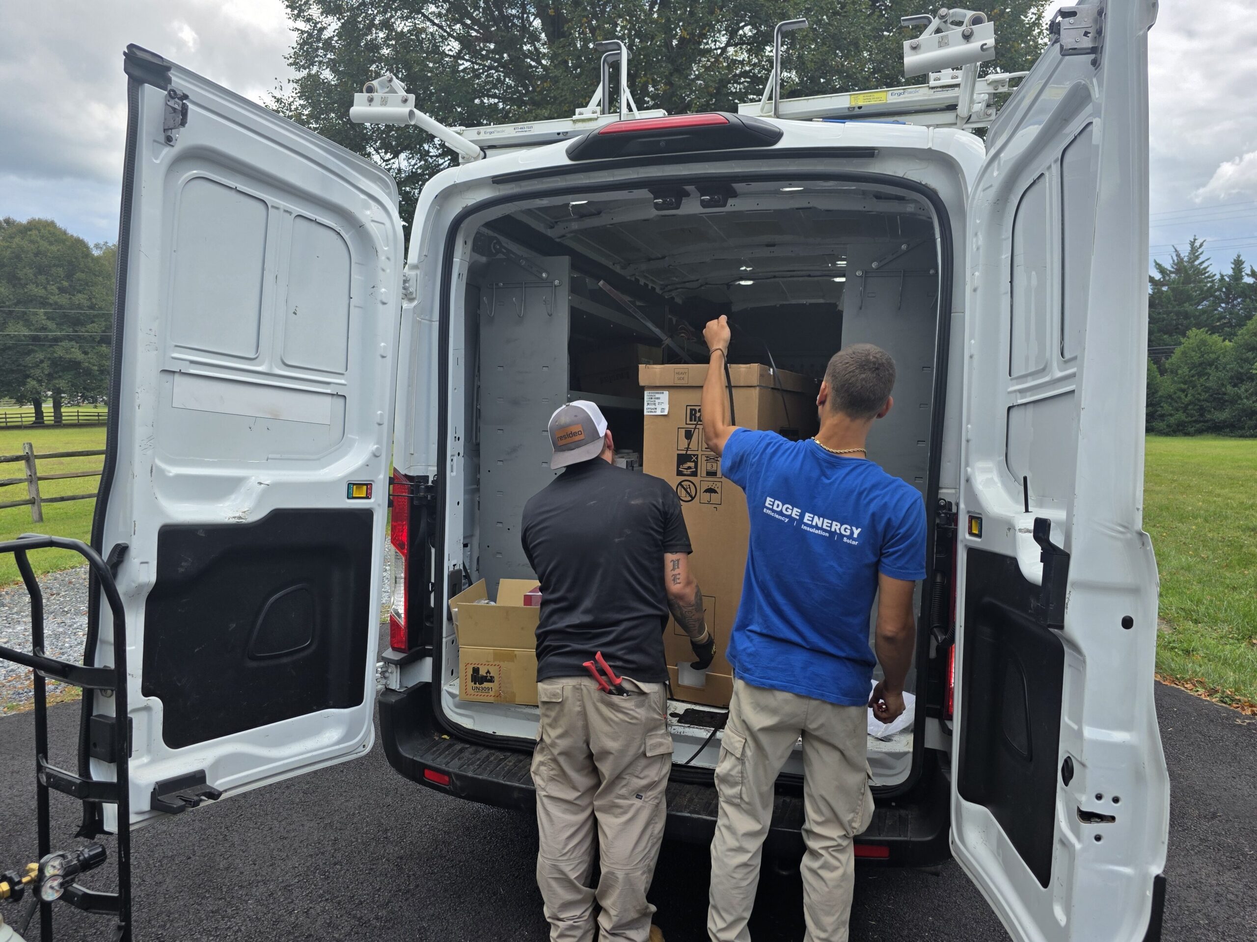 HVAC technicians at work for heat pump installation